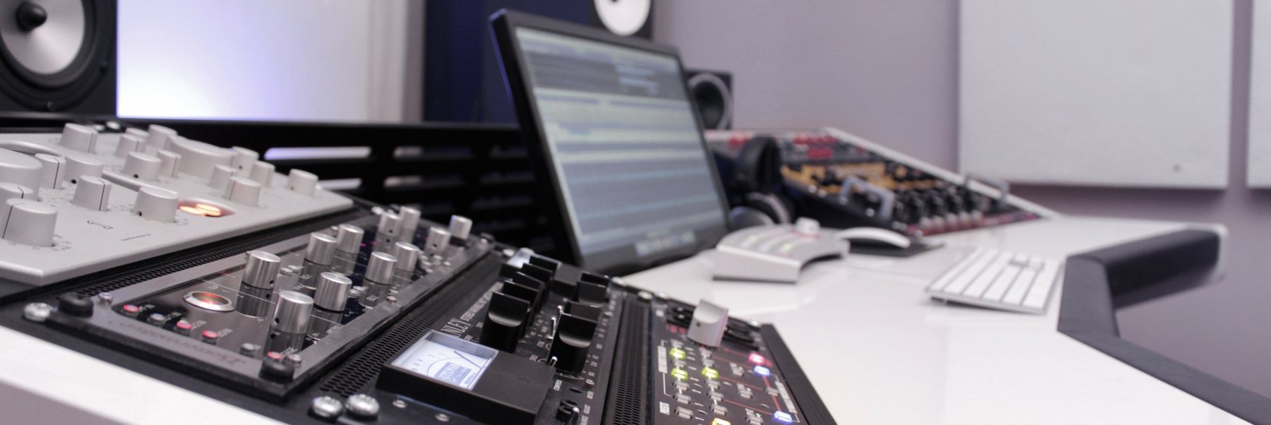 Mastering desk with outboard gear and monitors at Milian Mastering in Hamburg